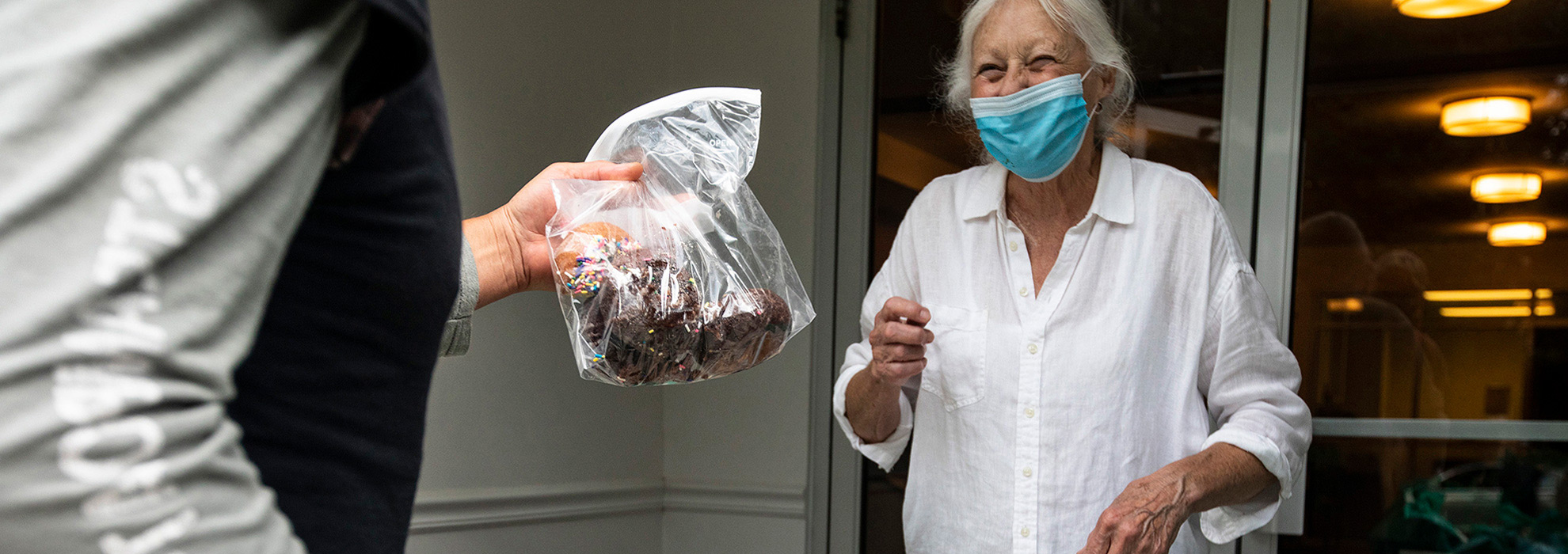 Lady handing out food